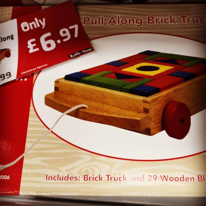 Wooden pull along truck with 29 blocks