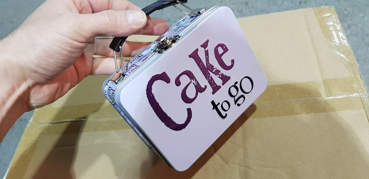 New cake to go tins in stock