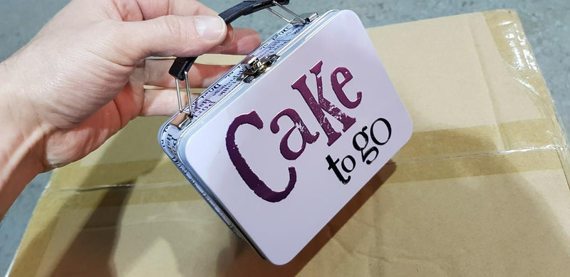 New cake to go tins in stock