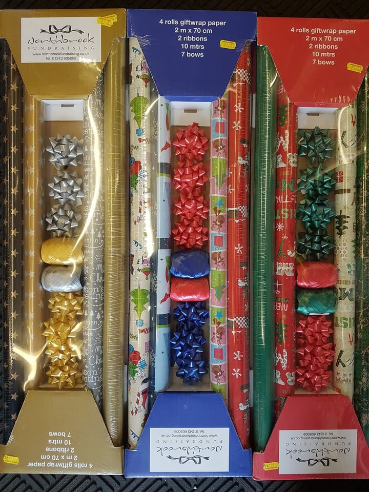 Christmas wrap and ribbon bows now just £2