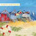 Seaside beach huts birthday greeting card
