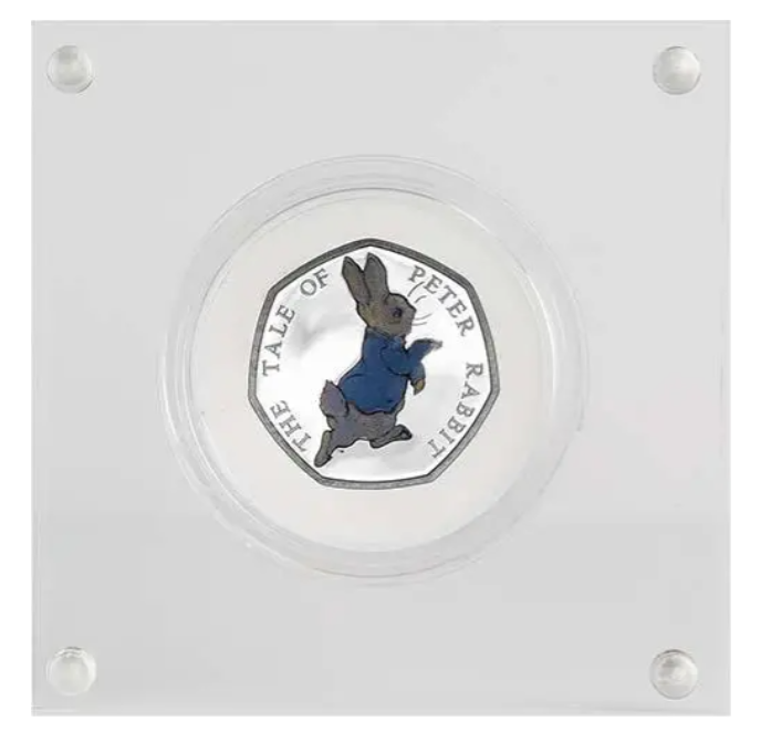Peter Rabbit part of Beatrix Potter coloured 50p coin release by Royal Mint